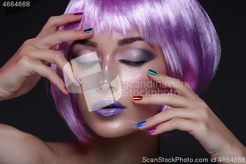 Image of Beautiful girl in purple wig