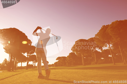 Image of golf player hitting shot