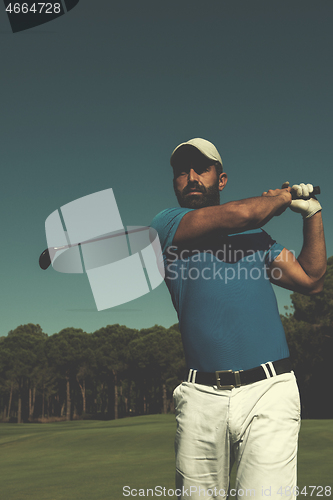 Image of golf player hitting shot