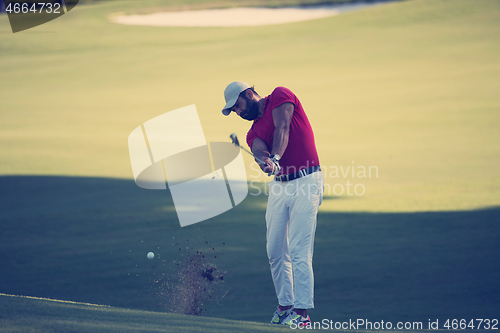 Image of golf player hitting long shot