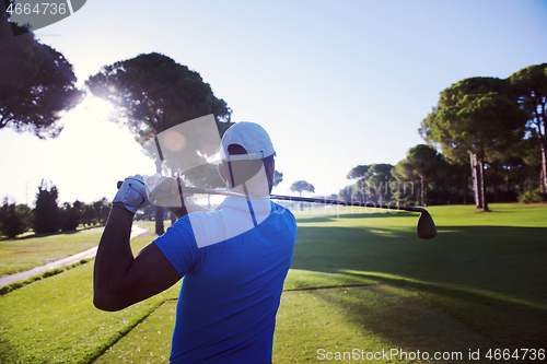 Image of golf player hitting shot