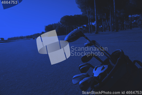Image of close up golf bag on course