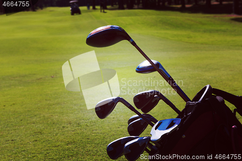 Image of close up golf bag on course