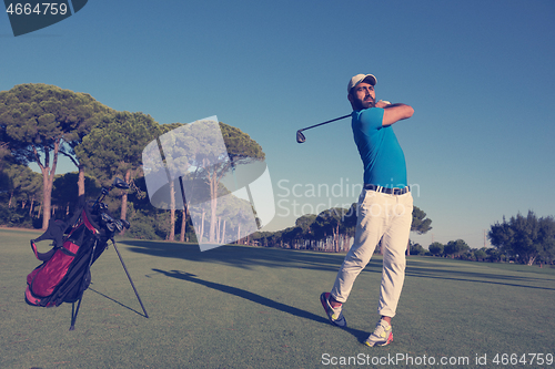 Image of golf player hitting shot