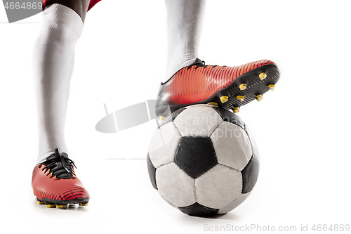 Image of legs of soccer player close-up isolated on white