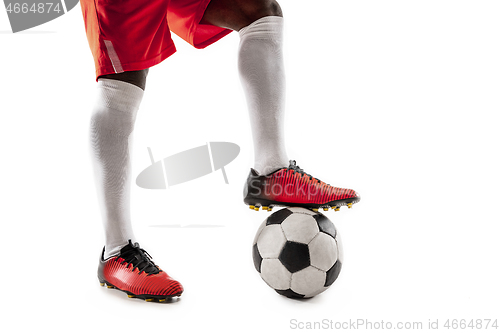 Image of legs of soccer player close-up isolated on white