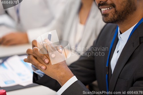 Image of close up of businessman at business conference