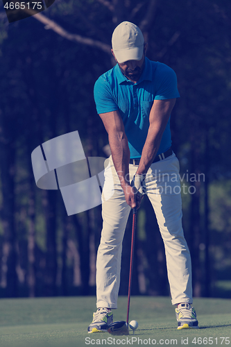 Image of golf player hitting shot