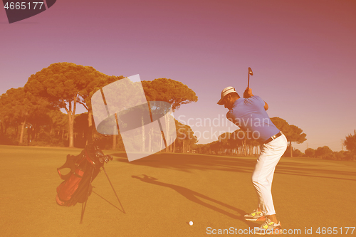 Image of golf player hitting shot