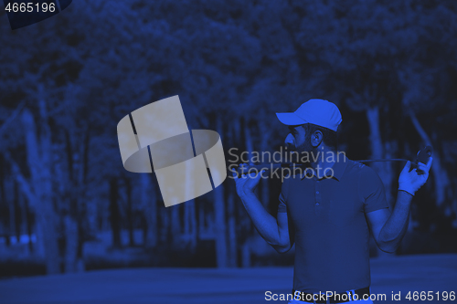 Image of golf player portrait at course