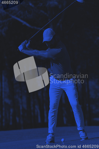 Image of golf player hitting shot