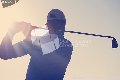 Image of golf player hitting shot