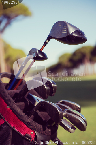 Image of close up golf bag on course