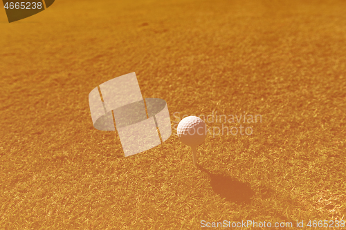 Image of golf ball on tee