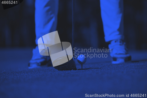 Image of golf player hitting shot