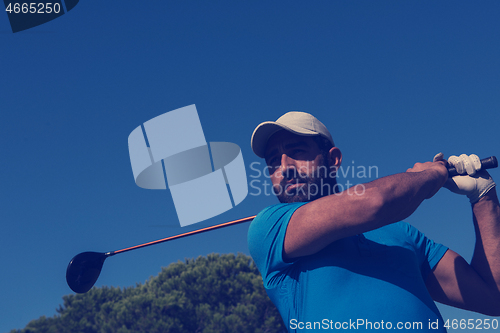 Image of golf player hitting shot