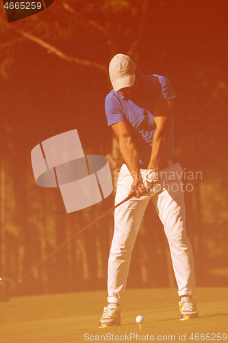 Image of golf player hitting shot