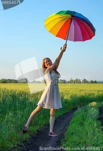 Image of girl with a multicolored umbrella