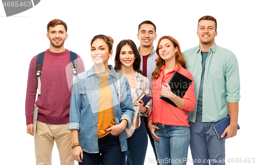 Image of group of smiling students with books