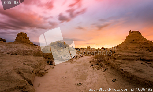 Image of Sunset in sandy desert