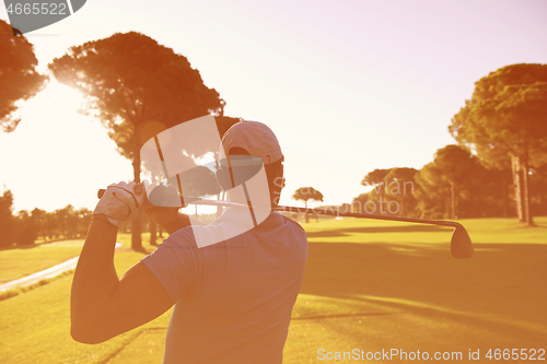 Image of golf player hitting shot