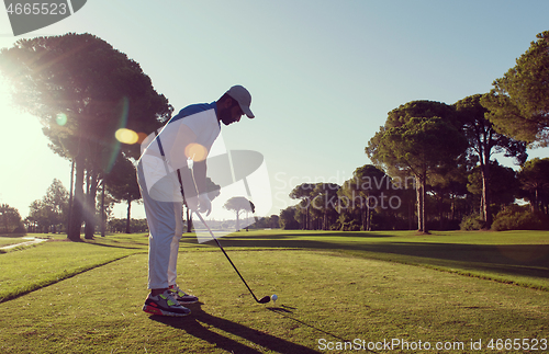 Image of golf player hitting shot