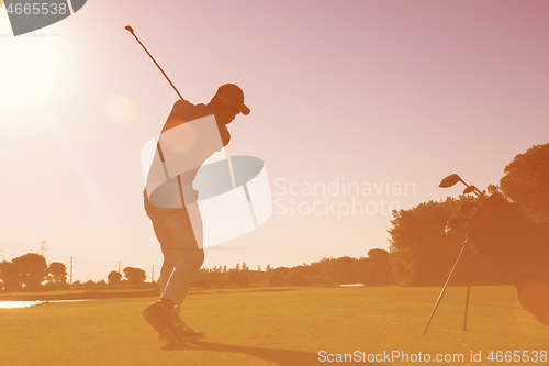 Image of golf player hitting shot
