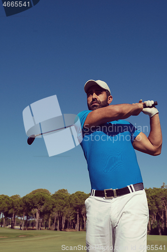 Image of golf player hitting shot