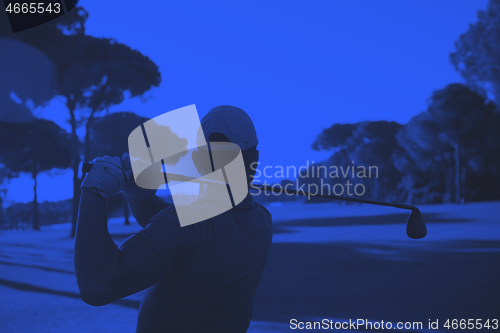 Image of golf player hitting shot