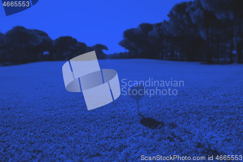 Image of golf ball on tee