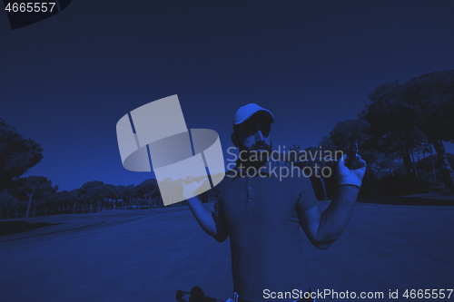 Image of golf player portrait at course