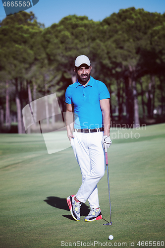 Image of golf player portrait at course