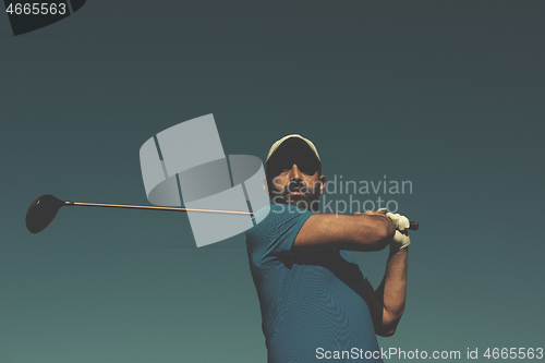 Image of golf player hitting shot