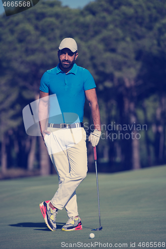 Image of golf player portrait at course