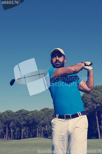 Image of golf player hitting shot