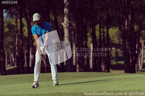 Image of golf player hitting shot