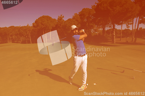 Image of golf player hitting shot