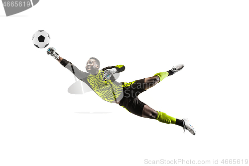 Image of One soccer player goalkeeper man catching ball