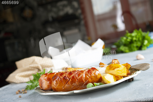 Image of sausages with potato