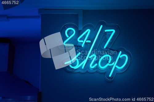 Image of Twenty-four seven shop sign