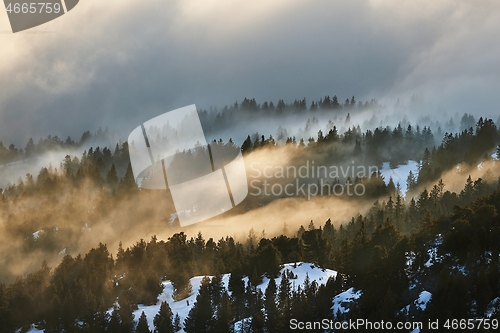 Image of Misty winter snow mountain landscape