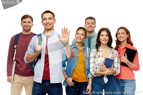 Image of group of students with books and school bags