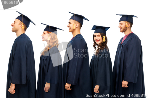 Image of graduates in mortar boards and bachelor gowns