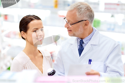 Image of apothecary and woman with drug at pharmacy