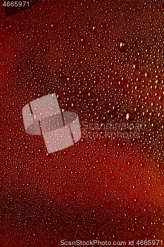 Image of Close up view of cold drops on the glass of beer