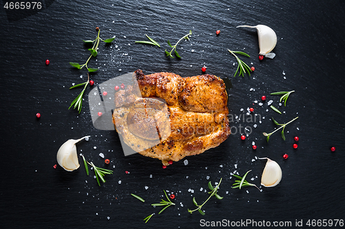 Image of Grilled pork steak with spices, herbs and garlic