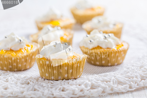 Image of Homemade lemon curd cupcakes with whipped cream