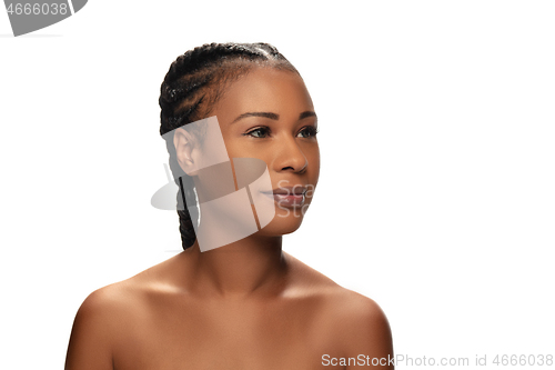 Image of Portrait of beautiful african-american woman isolated on white studio background. Beauty, fashion, skincare, cosmetics concept.