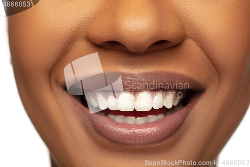 Image of Portrait of beautiful african-american woman isolated on white studio background. Beauty, fashion, skincare, cosmetics concept.