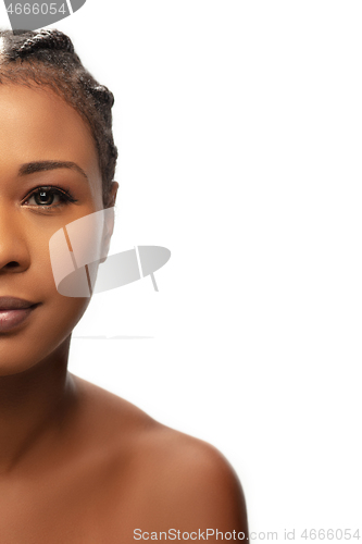 Image of Portrait of beautiful african-american woman isolated on white studio background. Beauty, fashion, skincare, cosmetics concept.